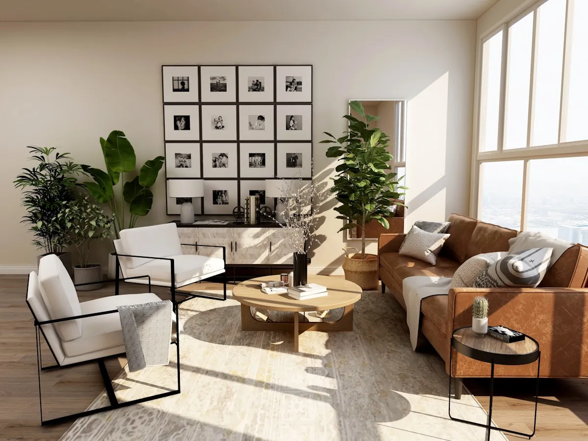 Living room with a tan sofa and greenery